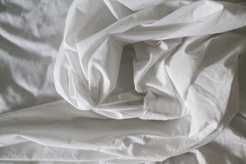 white wrinkled sheets